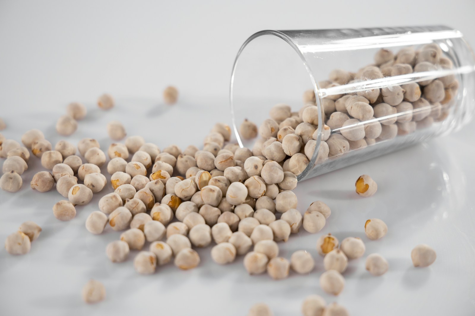 Photo by engin akyurt white and brown beans on silver steel rack