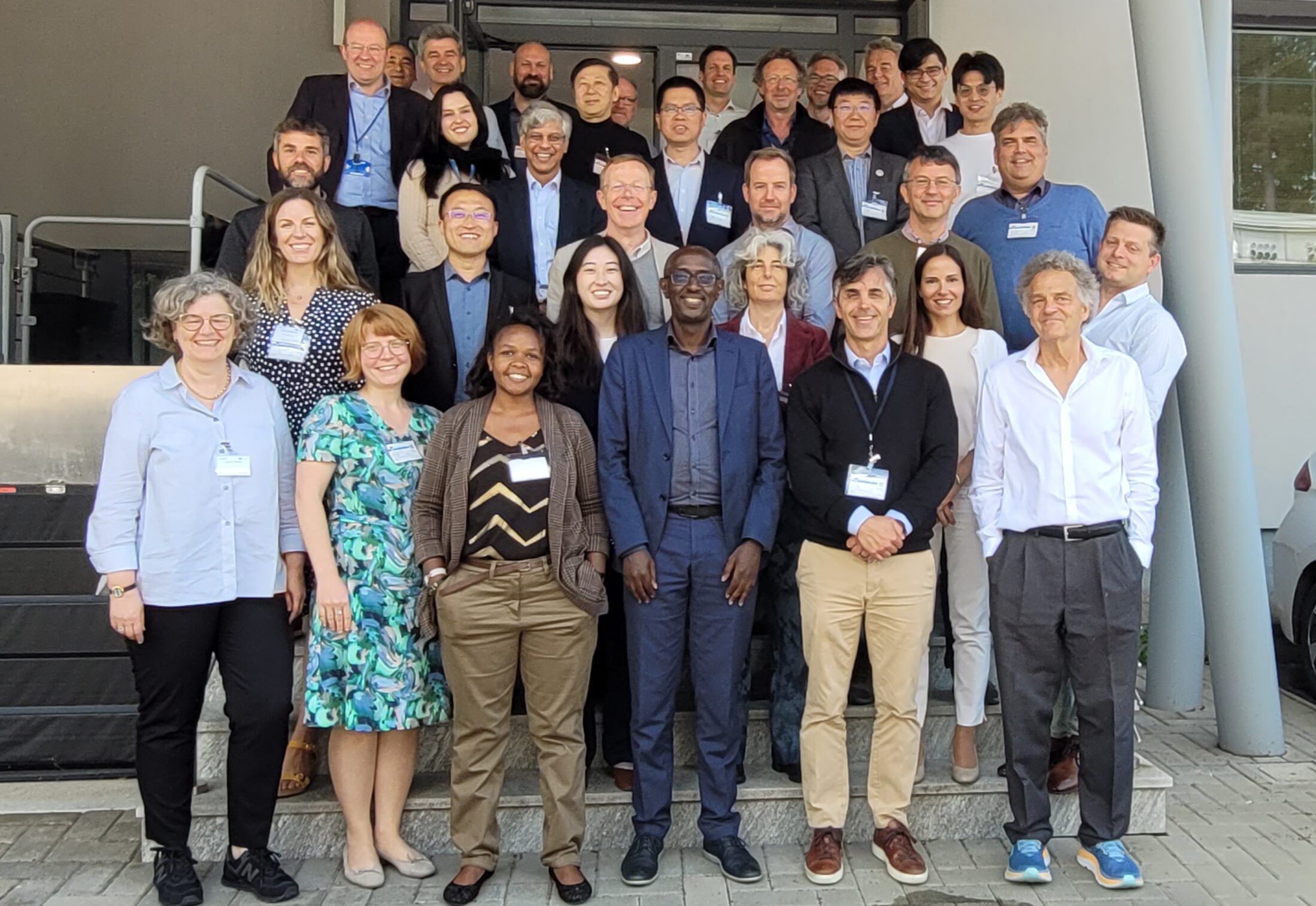 1000030525 three persons farming on field