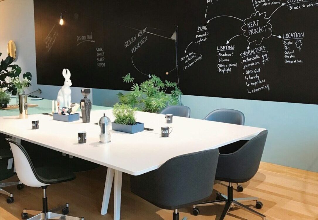 Photo by Elena Baidak white wooden table with chairs
