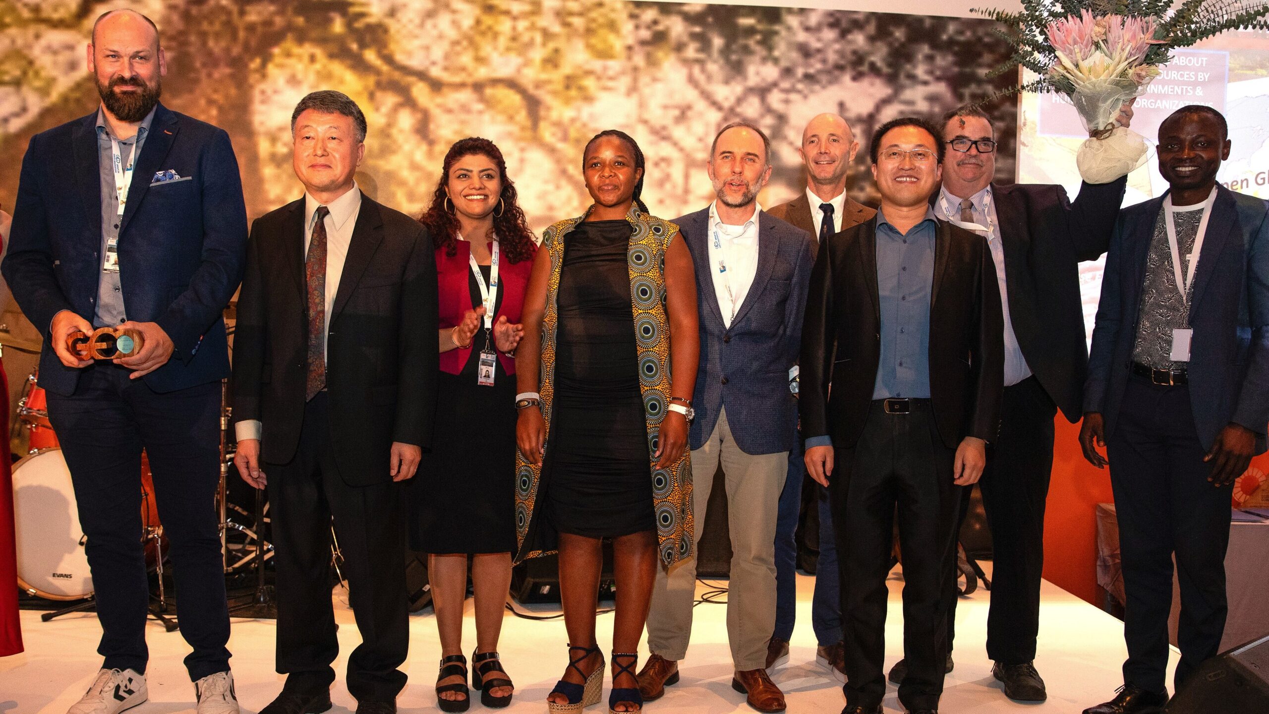 GEOGLAM Team at GEO WEEK 2023 GEOGLAM Team receiving the Team Impact Award at the GEO Week Gala Dinner